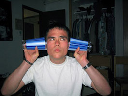 Headshot of me with cups on my ears, from putcupsonyourears.com